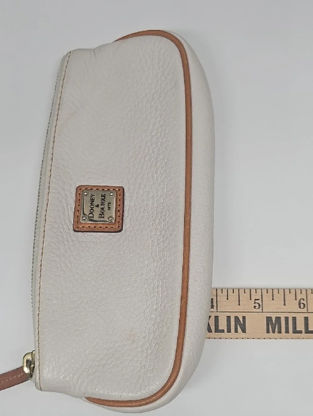 Dooney & Bourke Cream Leather Pouch
